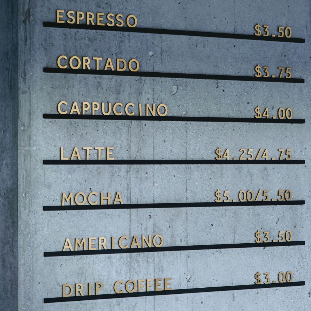 black rails and bronze letters for cafe and restaurant menu displays